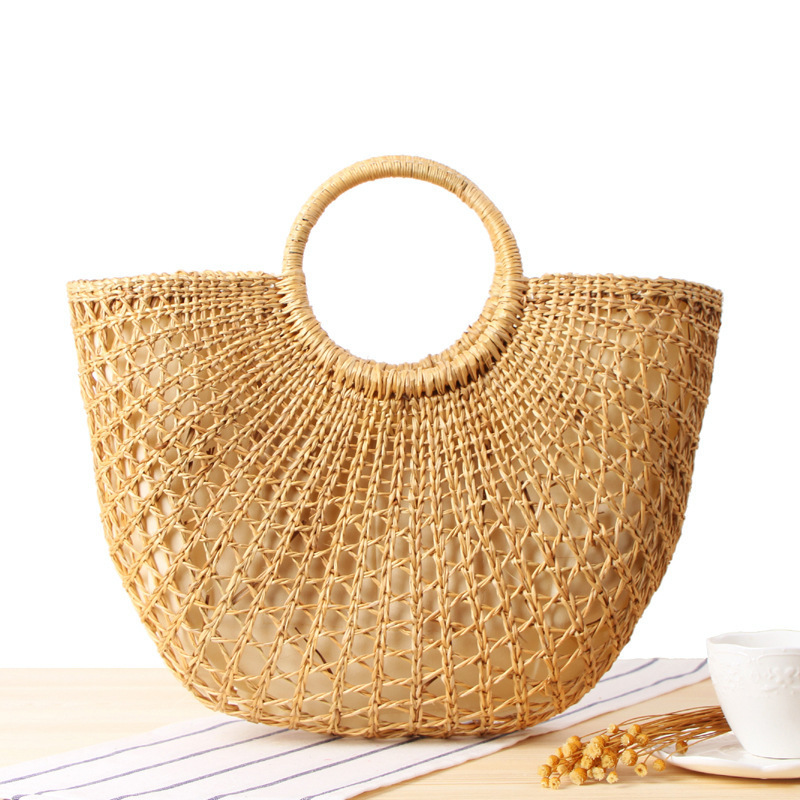 Fashionable Handmade Yellow Grass Woven Handbags Rattan Summer Beach Bag Drawstring Straw Bag With Colorful Tassel Wool Ball