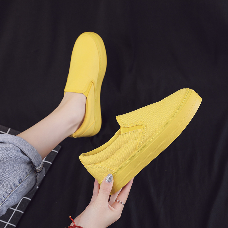 China wholesale footwear manufacturer summer yellow flat bulk canvas sneakers rubber sole slip on platform women's casual shoes