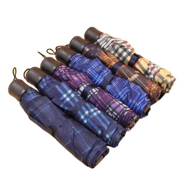 Wholesale low price mini beautiful alloy 8-bone umbrella foreign trade gifts plaid folding umbrella advertising umbrella