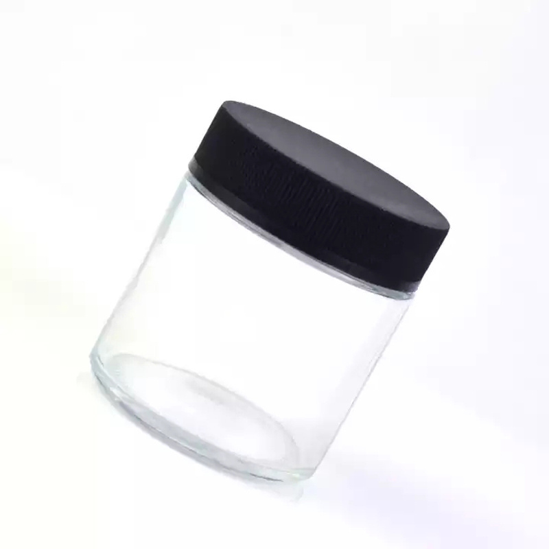 Custom packaging logo printed 1oz 2 oz 3 oz 4 oz straight sided glass jars child resistant glass jar with CR black lid