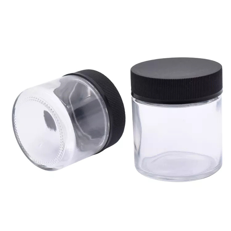 Custom packaging logo printed 1oz 2 oz 3 oz 4 oz straight sided glass jars child resistant glass jar with CR black lid