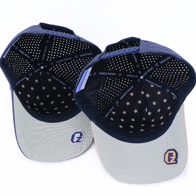 Qianzun rubber patch waterproof lightweight polyester performance perforated 5 panel laser cut baseball cap custom golf hat