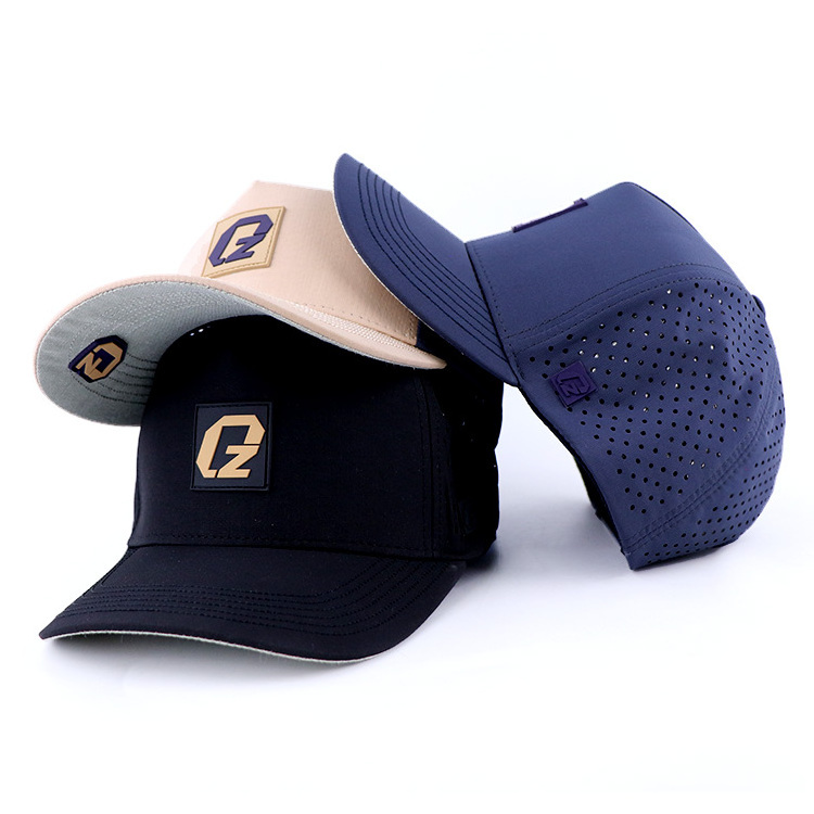 Qianzun rubber patch waterproof lightweight polyester performance perforated 5 panel laser cut baseball cap custom golf hat