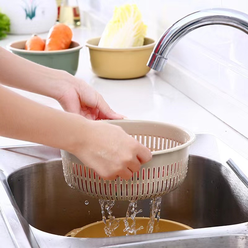 Kitchen double fruit and vegetable plastic contrast drain basket round plastic thickened storage vegetable drain basket.