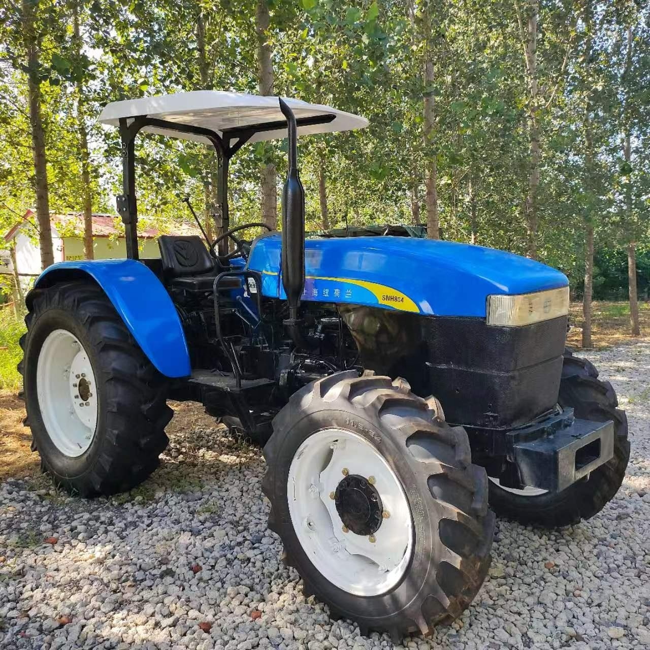 Used Agricultural Machinery Farm Wheel Small Mini Compact Tractors New Holland Snh754 With dry tires and farm tools