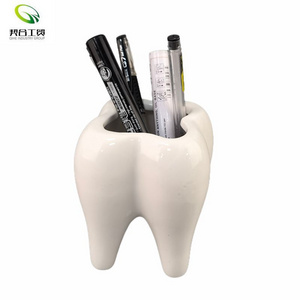 Lovely White Tooth Shaped Ceramic Pen Holder wholesale Cheap Ceramic Tooth Pencil Holder Unique Tooth Pen Container