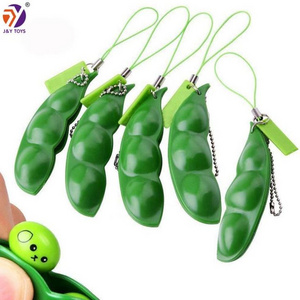 Wholesale cheap adult kids stress relief and anti-anxiety sensory fidget popper keychain squeeze pea pod fidget toys