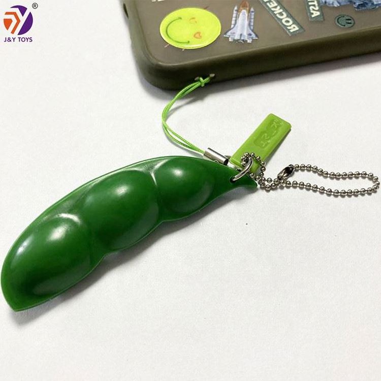 Wholesale cheap adult kids stress relief and anti-anxiety sensory fidget popper keychain squeeze pea pod fidget toys