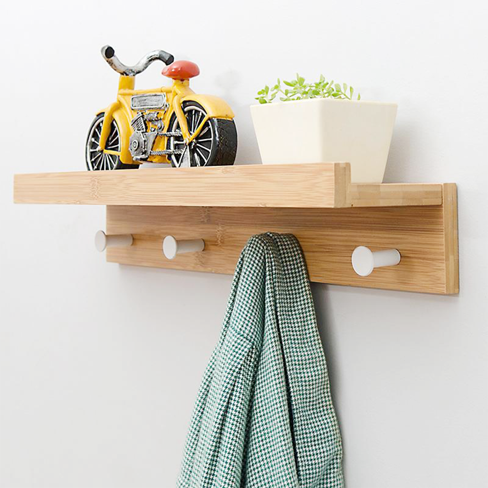 Minimalist bamboo wall shelf with storage hooks used for living room bedroom