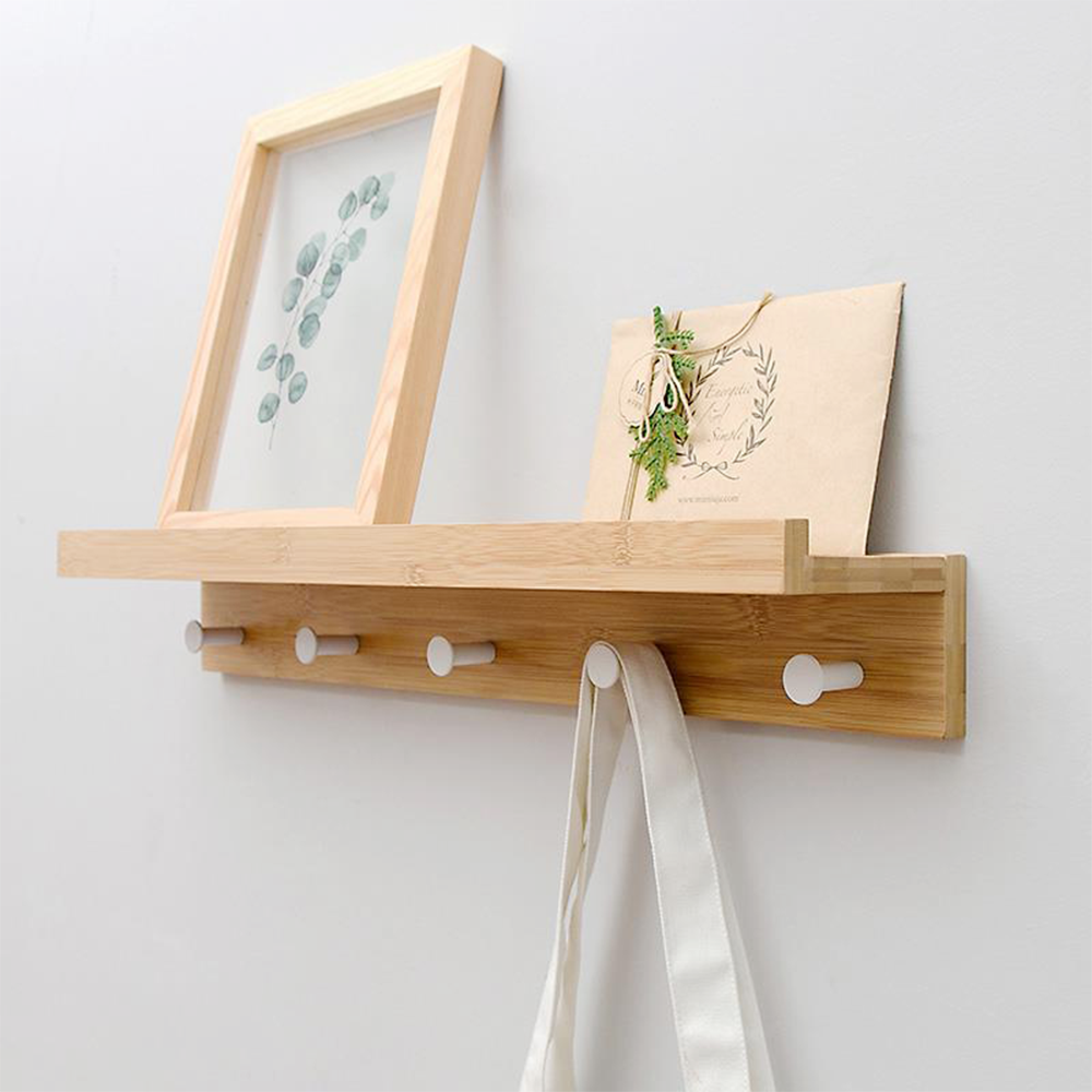 Minimalist bamboo wall shelf with storage hooks used for living room bedroom