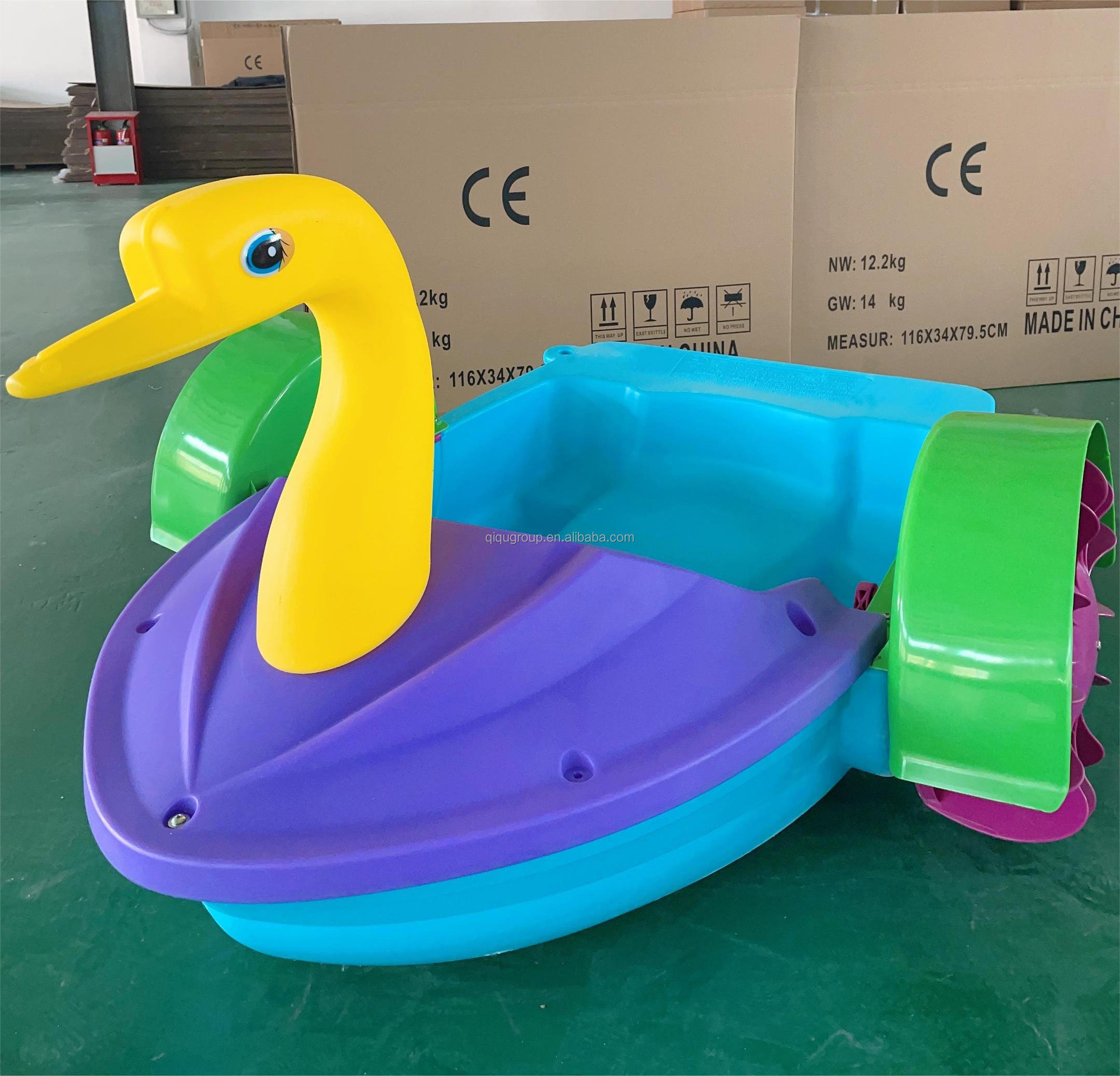 Wholesale customized musilc light plastic swan kids hand paddle boat