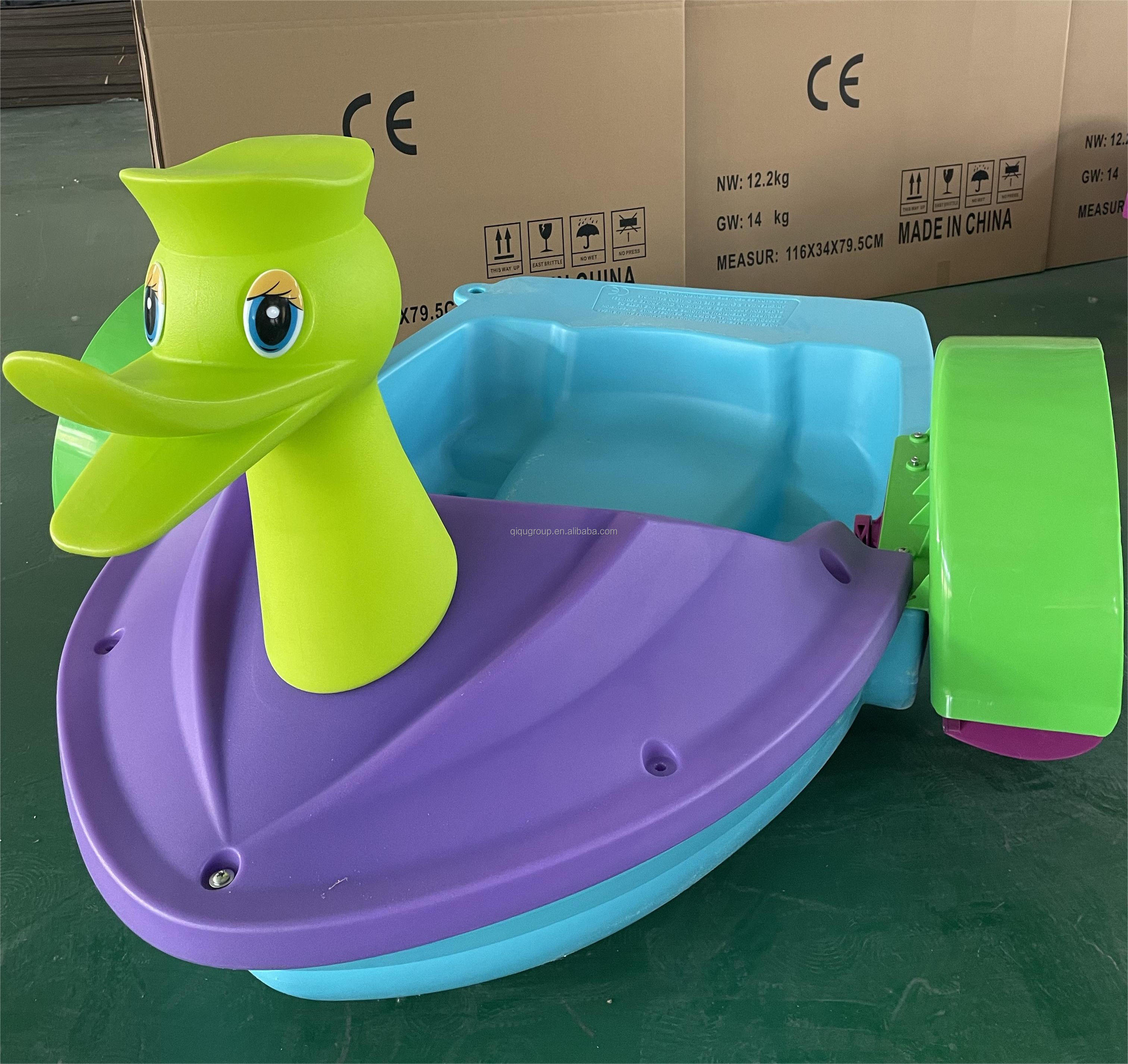 Wholesale customized musilc light plastic swan kids hand paddle boat