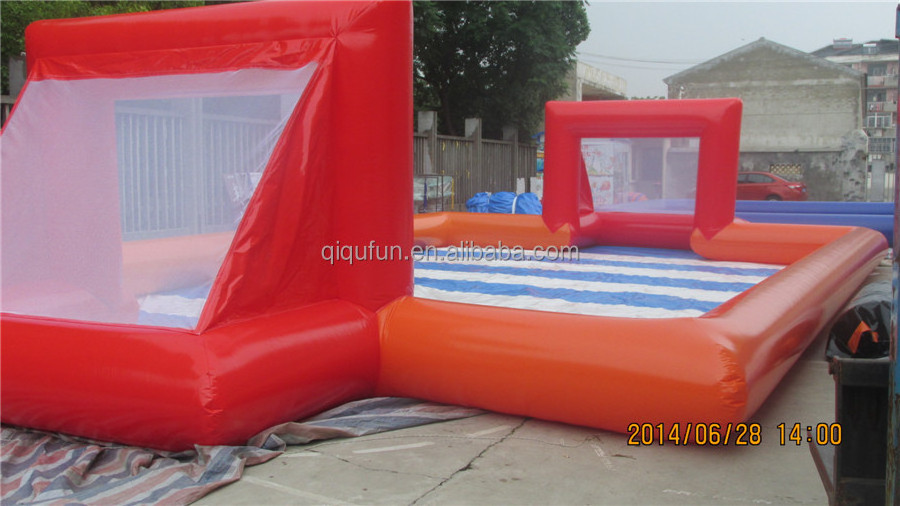 Popular indoor or outdoor sports game pvc tarpaulin football court soap mini inflatable soccer field for adults and kids