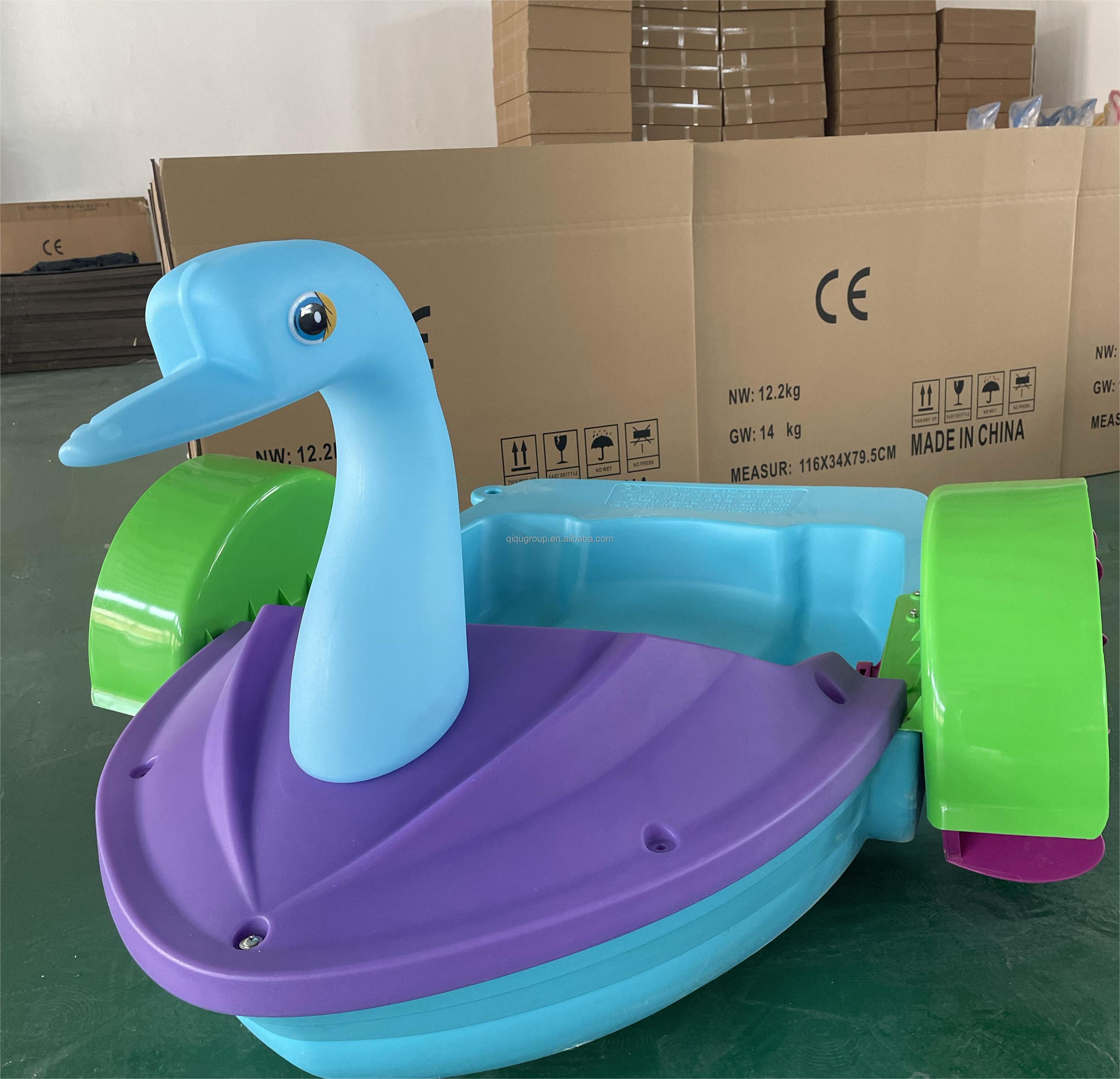 Wholesale customized musilc light plastic swan kids hand paddle boat