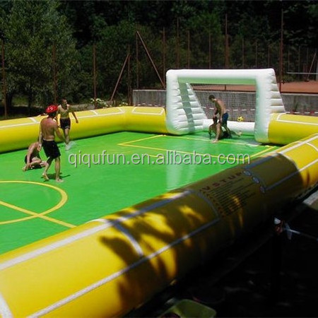 Popular indoor or outdoor sports game pvc tarpaulin football court soap mini inflatable soccer field for adults and kids