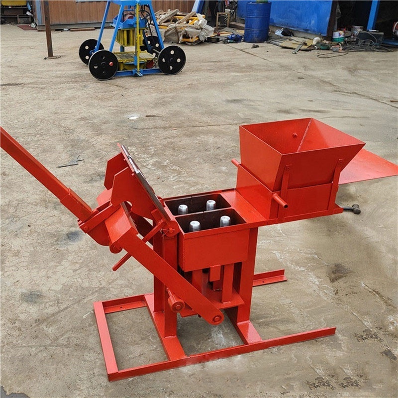 Hot selling QMR2-40 red clay brick making machine interlocking manual hollow brick machine price in Ghana