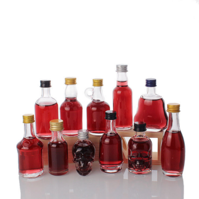 2022 New Wholesale 50ml Mini Small Sample Alcohol Juice Drinks Glass Wine Liquor Glass Bottle With Screw Lid for sale