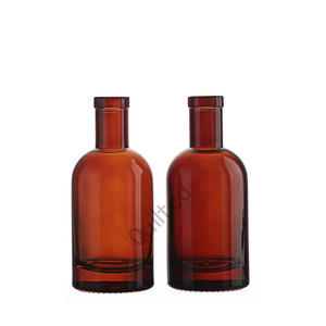 Wholesale Custom Flint Clear amber Round Classical Empty Brandy Gin Rum Vodka Tequila Liquor Glass Bottle with Cork Stopper