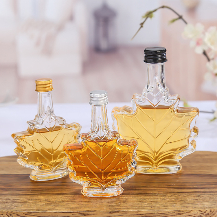 Christmas Wedding Gift 50ml 100ml 250ml Maple Shape Liquor Glass Bottle With Screw Metal Cap For Pure Syrup Wine Whisky