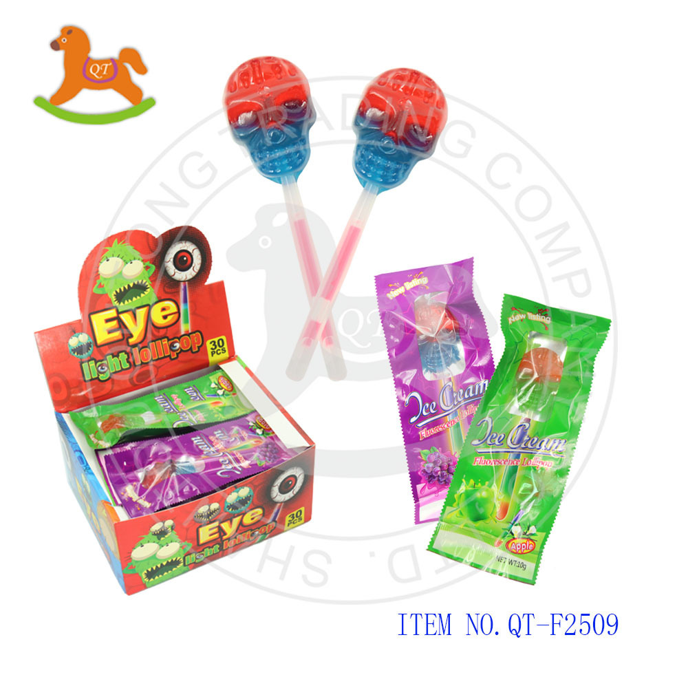 Glowing skull hard lollipop sweet candy with stick