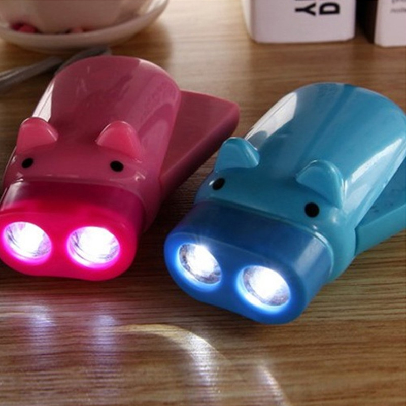 QXMOVING Cute Pig Shaped 2 LED Hand Crank Pressing Dynamo Mini LED Flashlight Emergency Usage