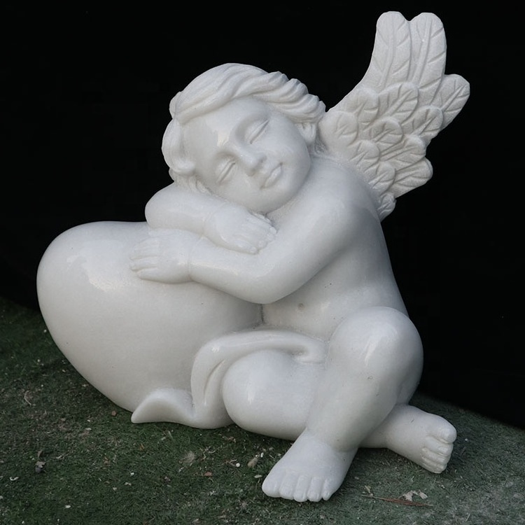 Well selected white marble stone carved little baby angel holding heart headstone