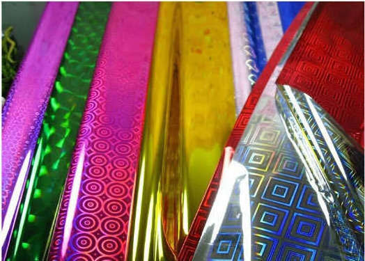 BOPP HOLOGRAPHIC COLORED FILM IN MANY KINDS OF COLOR WITH DIFFERENT DESIGN CLEAR AND METALLIZED