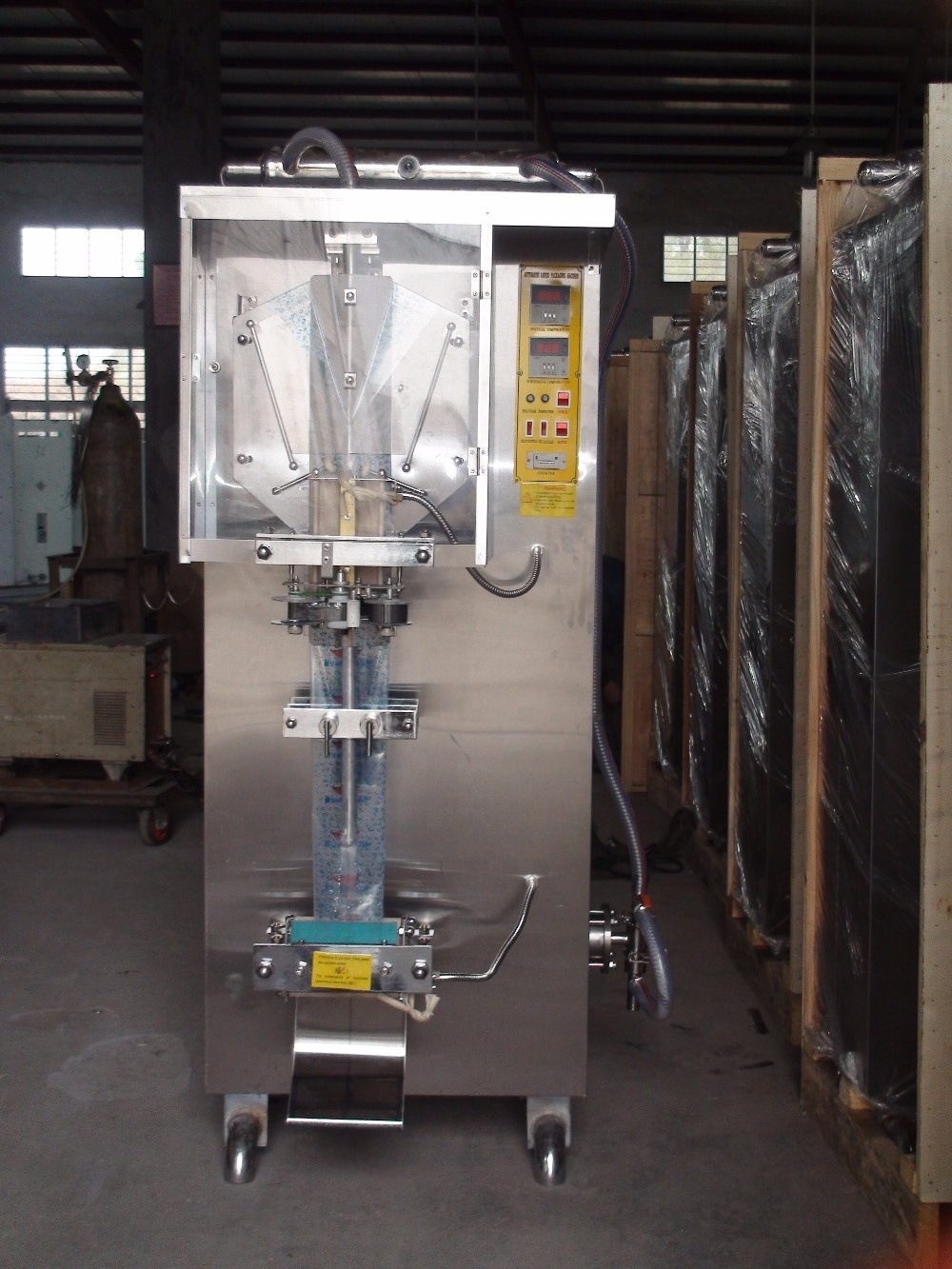 Hot Sale Automatic Production Plastic Bag Drinking Sachet Pure Water Filling Making Packaging Machine Price in China