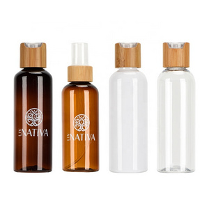 customize refillable cosmetic packaging 60ml 100ml 120ml amber pet plastic cosmetic bottle with bamboo disc top bamboo spray