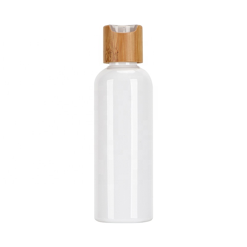 customize refillable cosmetic packaging 60ml 100ml 120ml amber pet plastic cosmetic bottle with bamboo disc top bamboo spray