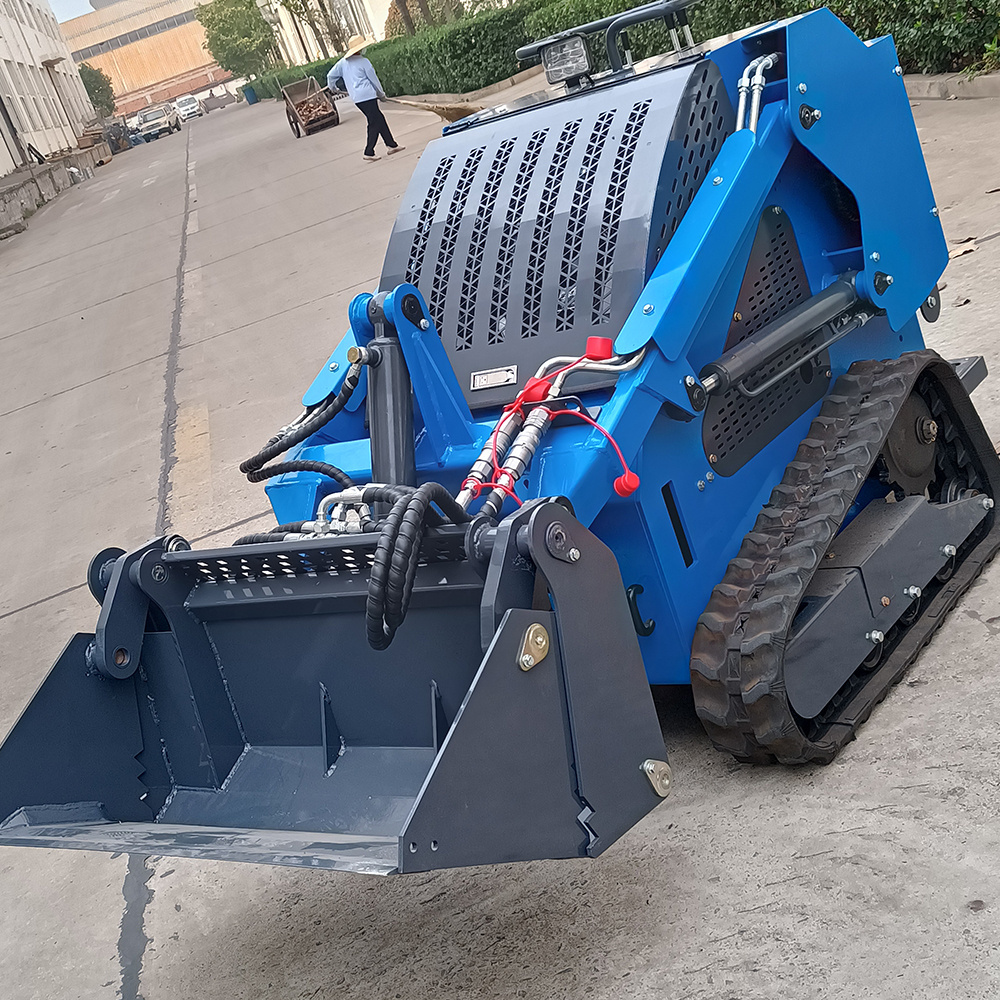 Small crawler electric skid steer loader with wood grabber