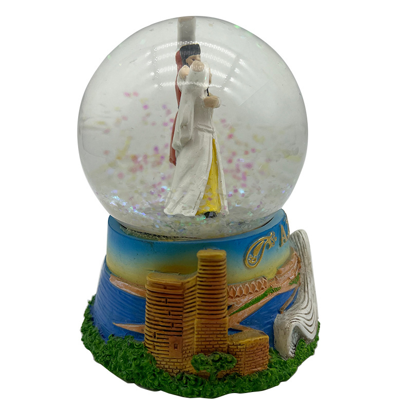 Custom Azerbaijan Dancing Couple statue resin craft glass snow globe for promotional souvenir gifts