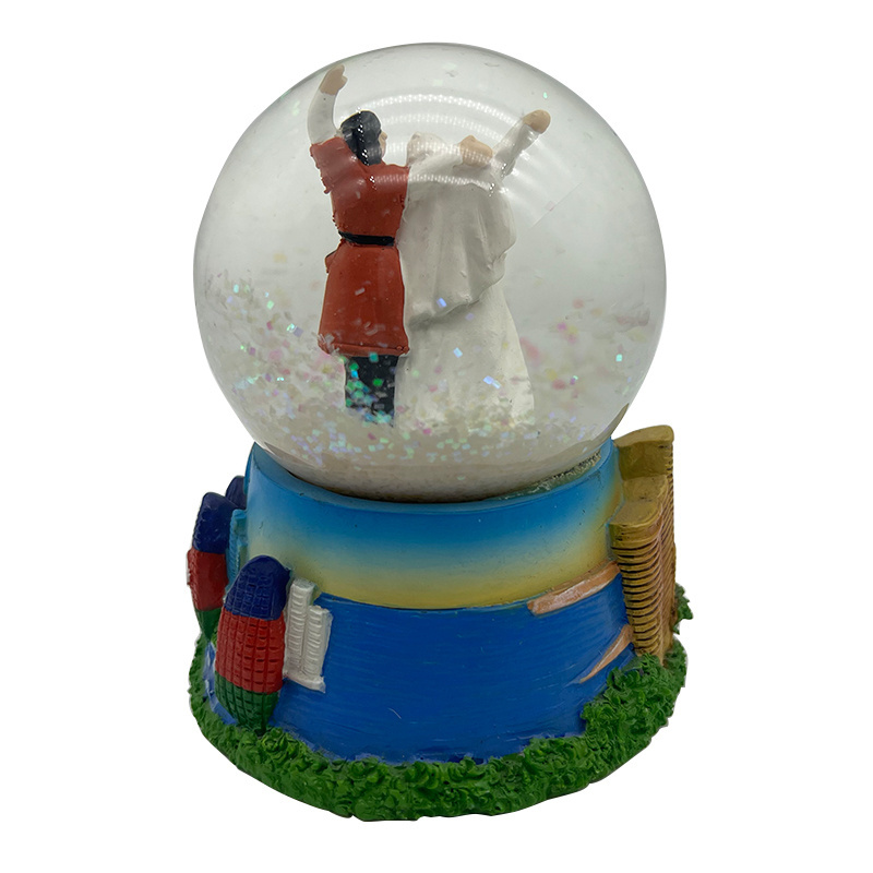 Custom Azerbaijan Dancing Couple statue resin craft glass snow globe for promotional souvenir gifts