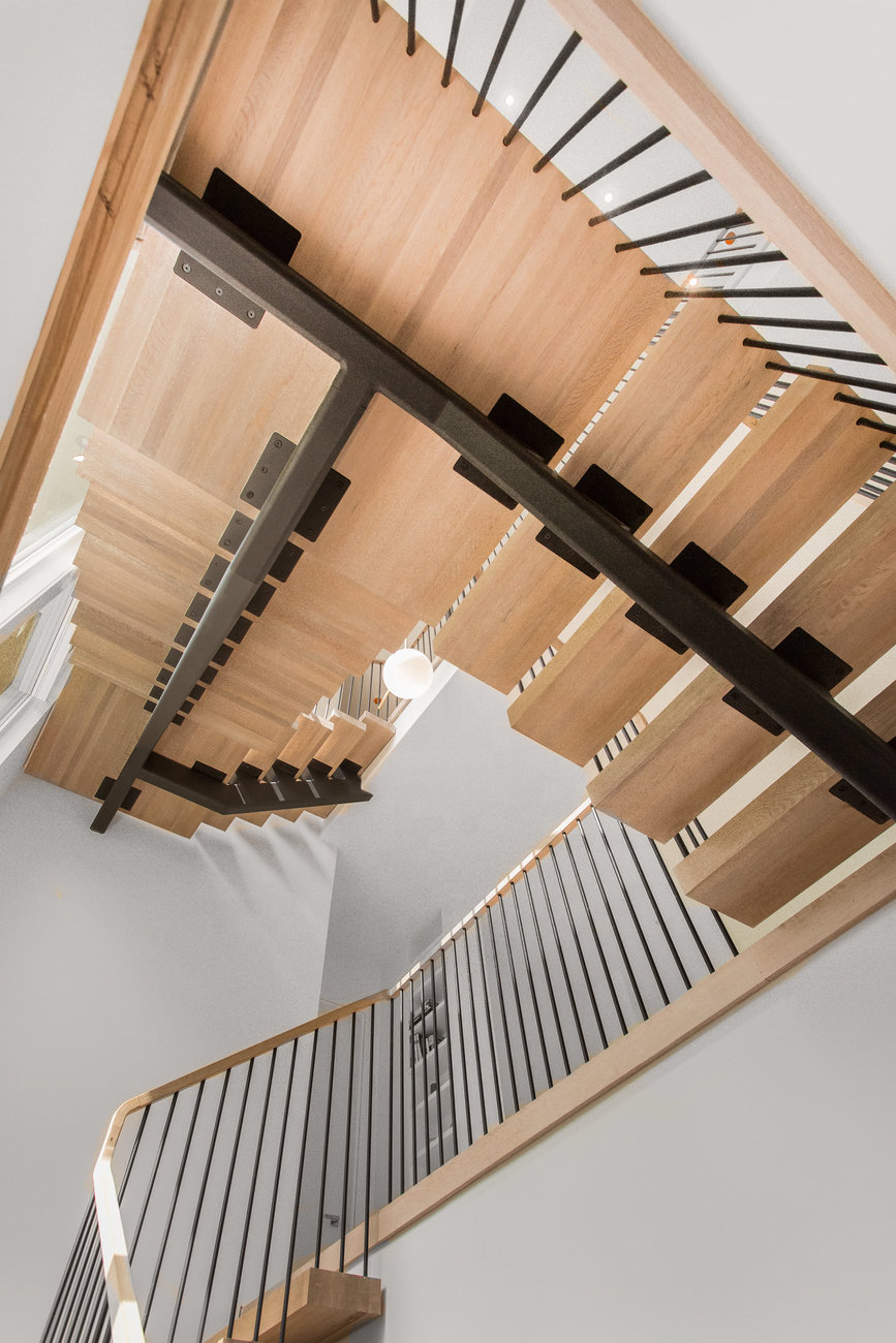 Modern Mono-Stringer Steel Spindle Railing On Floating Stairs With White Oak Treads And Top Rail Stairs