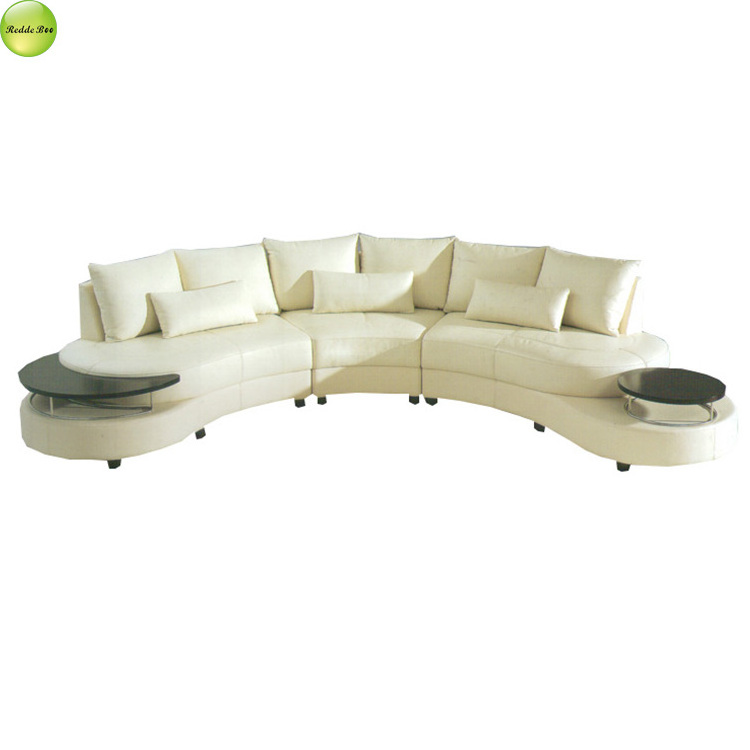 Half circle leather and metal sofa with two glass on the side and round ottoman