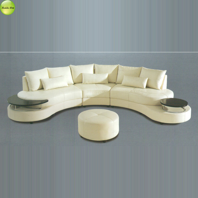 Half circle leather and metal sofa with two glass on the side and round ottoman