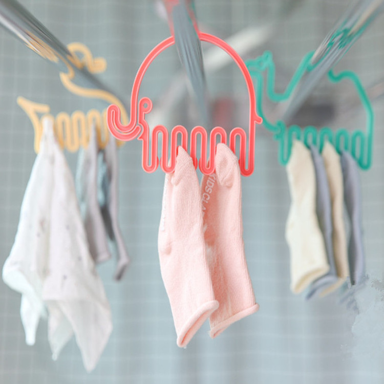 Cute baby socks dedicated clothes hanger multi-clip drying socks artifact home clip cool baby clothes bib