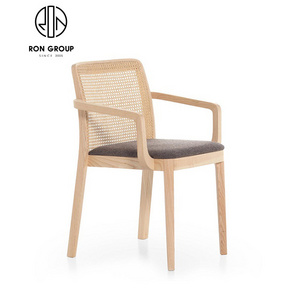 Wholesale Cheap Price OEM Cafe Shop Outdoor Furniture Solid Wood Leg Fabric Cushion Restaurant Dining Chair with Rattan Backrest