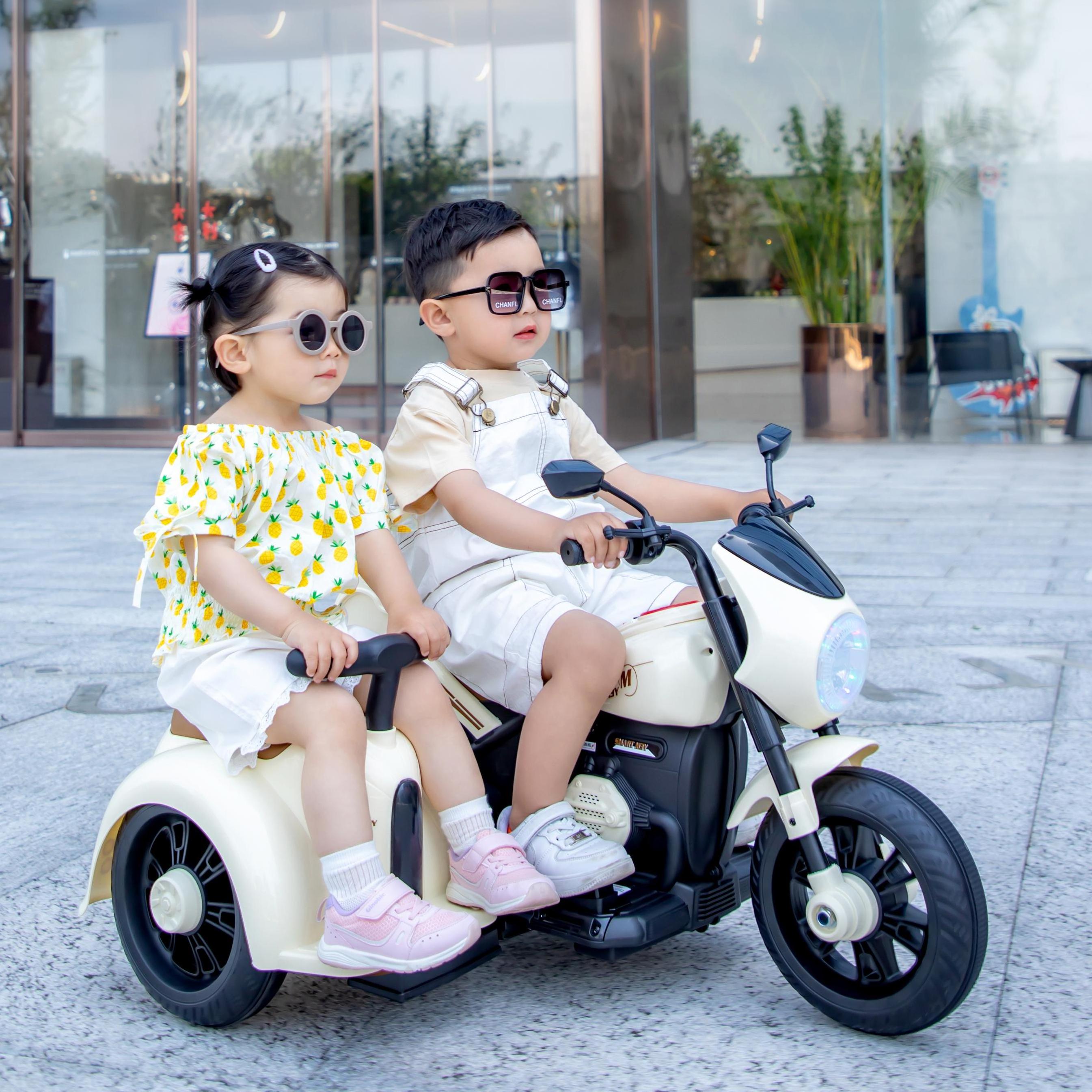 Safe and durable two seater electric motorcycle for children sold 12v battery driven car 3-12 years old