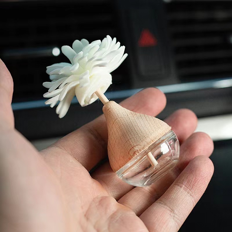 Wholesale Wood Car Aroma Diffuser 8ml 10ml Car Perfume Bottle With Wood Cap And Sola Flower