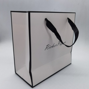 Luxury Gift Paper Shopping Bag Custom Made Printed Logo Jewelry Packaging Kraft Shopping Paper Bag With Ribbon Handles