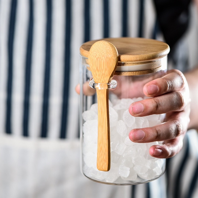 2022 Eco-Friendly Feature borosilicate glass food spice jar clear glass storage jar with bamboo spoon and press lid