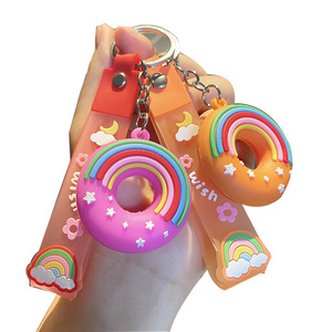 Wholesale Cute Schoolbag Rubber Pendant Cartoon Rainbow Keychain 3D doughnut Soft PVC keychain with Custom Wristband