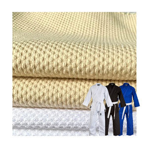 OEM ODM GRS Tear Resistant Jiu Jitsu Gi Kimono Fabric Pearl Weave 450GSM 100% Cotton Bleach White Judo Gi Fabric