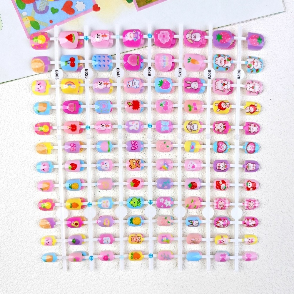 Wholesale nails for kids Colorful rainbow cute kids nail presses with glue nail artificial