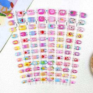 Wholesale nails for kids Colorful rainbow cute kids nail presses with glue nail artificial