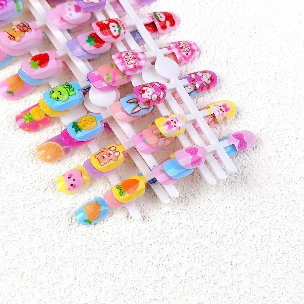 Wholesale nails for kids Colorful rainbow cute kids nail presses with glue nail artificial