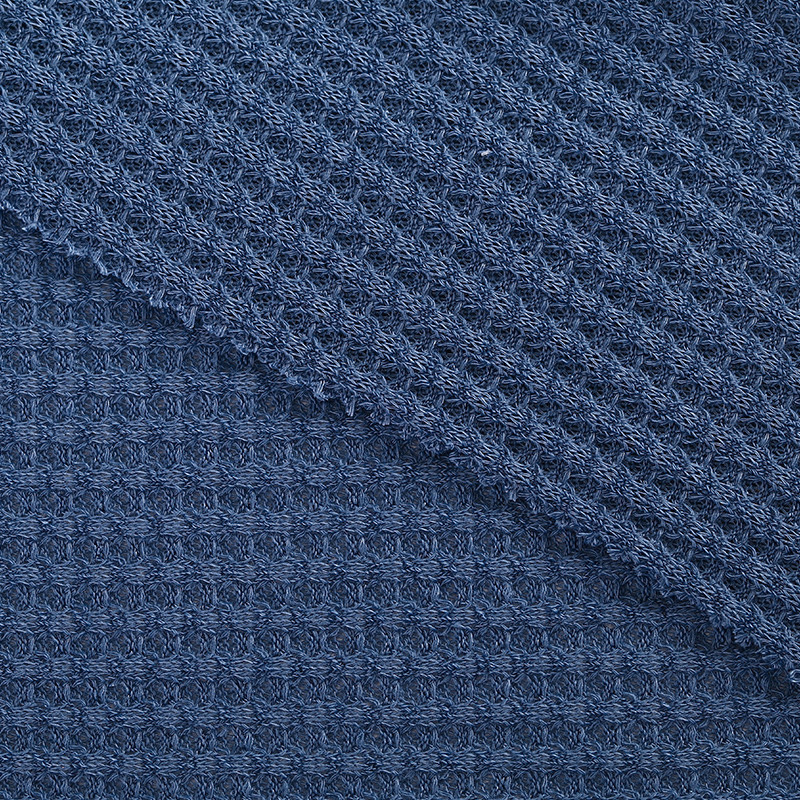 Spot spring  summer polyester ammonia waffle fabric thick needle hollow stretch  205g knitted jacquard fabric