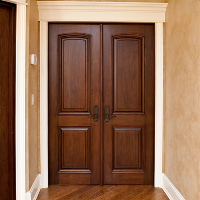 Restaurant entry solid hand and carved wooden door