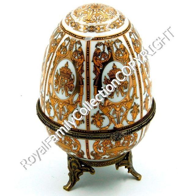 Large porcelain decorative egg - white and gold colour faberge style